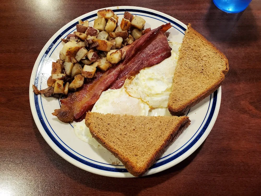 Eggs Sausage Patties Home Fries and Toast